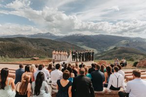 Outdoor-summer-ceremony-with-panoramic-mountain-views-at-the-Holy-Cross-Event-Deck-Colorado-by-Alicia-D'Elia-Photography