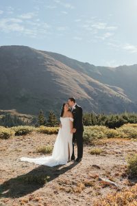 Couples-first-look-at-Loveland-Pass-before-Sapphire-Point-ceremony-by-Alicia-D'Elia-Photography