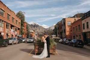 A Telluride elopement combining fall colors and fresh snow in the San Juan Mountains. Featuring a vow exchange at Bridal Veil Falls.