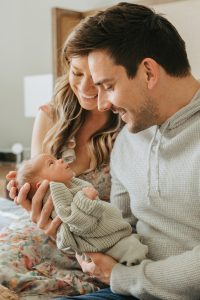 A sweet in-home newborn session with a family dog by Alicia D'Elia Photography, Colorado family photographer.