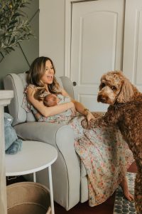 A sweet in-home newborn session with a family dog by Alicia D'Elia Photography, Colorado family photographer.