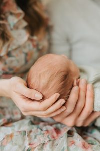 A sweet in-home newborn session with a family dog by Alicia D'Elia Photography, Colorado family photographer.