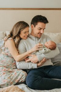 A sweet in-home newborn session with a family dog by Alicia D'Elia Photography, Colorado family photographer.