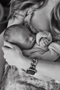 A sweet in-home newborn session with a family dog by Alicia D'Elia Photography, Colorado family photographer.